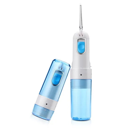 Portable water flosser with removable cap